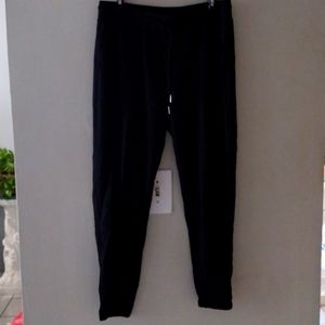 R Sofia jogger pants. Black with elastic at the bottom. Preloved. Size L